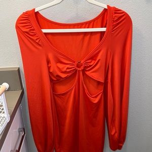 Red dress with cutout sides.
